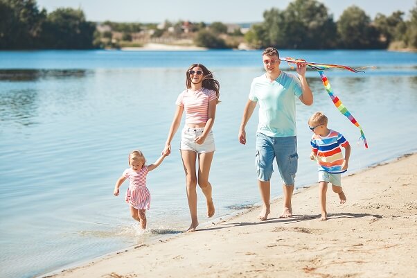 Happy family having fun in the Jacksonville Beach