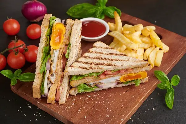 Club sandwich with French fries at Best Restaurants in Venice Florida